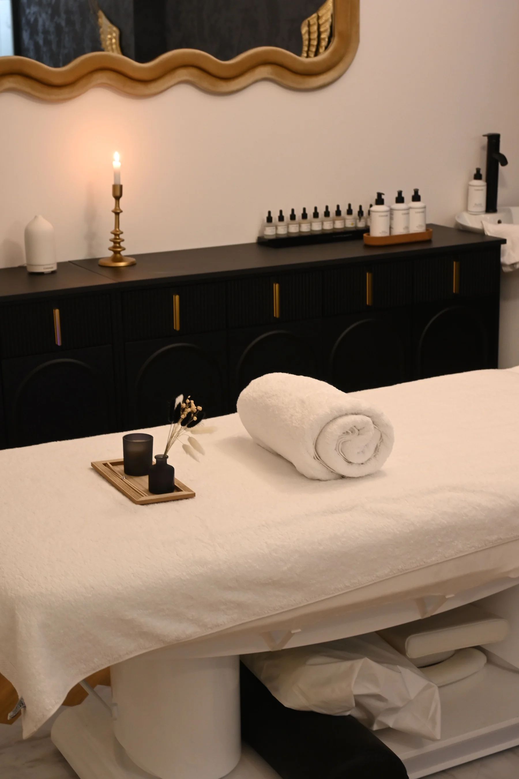 Elegant spa room prepared for a relaxing massage visit